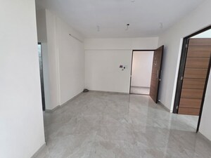 Room in 2.5 BHK Apartment at Rising Shree Hari Om Nagar, Borivali West – for Sale