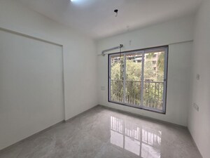 Room in 2.5 BHK Apartment at Rising Shree Hari Om Nagar, Borivali West – for Sale