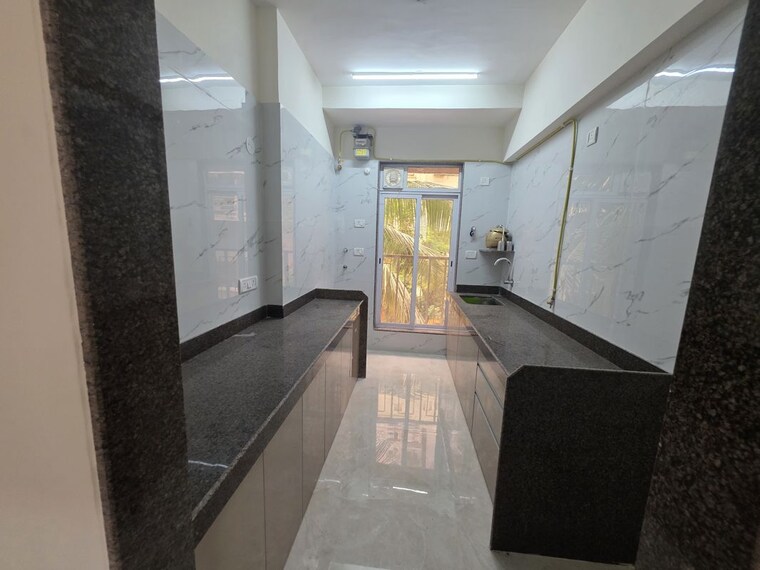 Kitchen, rising-shree-hari-om-nagar 2.5 Bedroom 700 Sq.Ft. Apartment In Borivali West Mumbai 10634391