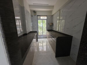 Kitchen in 2.5 BHK Apartment at Rising Shree Hari Om Nagar, Borivali West – for Sale