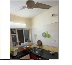 Kitchen in 2 BHK Builder Floor at Moraya Radhey Premlok CHS, Chinchwad – for Rent