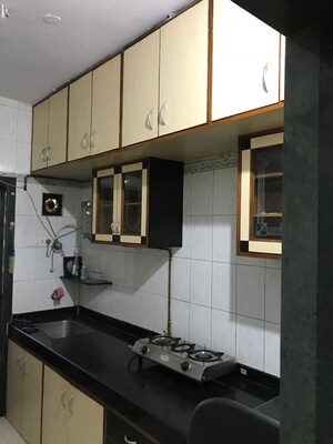 Kitchen in 2 BHK Apartment at Gayatri Shivam Apartment, Kandivali East – for Sale
