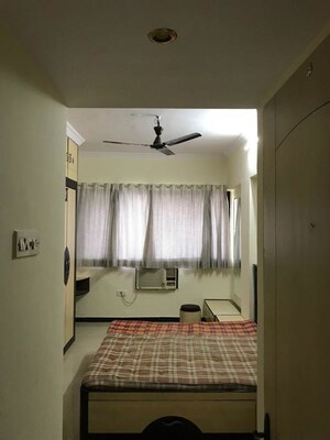 Bedroom in 2 BHK Apartment at Gayatri Shivam Apartment, Kandivali East – for Sale