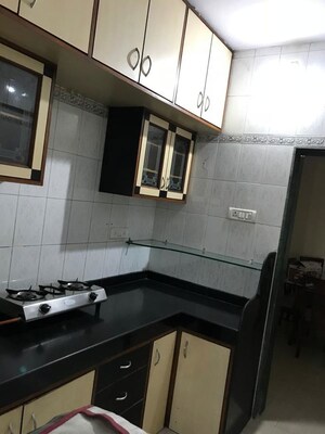 Kitchen in 2 BHK Apartment at Gayatri Shivam Apartment, Kandivali East – for Sale