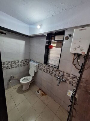 Bathroom in 2 BHK Apartment at Madhav Goregaon Prakash CHS, Goregaon West – for Rent