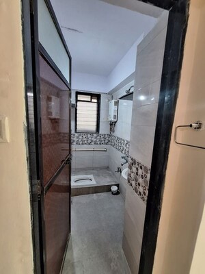 Bathroom in 2 BHK Apartment at Madhav Goregaon Prakash CHS, Goregaon West – for Rent