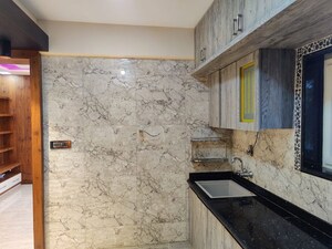 Kitchen in 2 BHK Apartment at Sai Cambridge Residency, Halasuru – for Rent