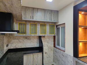 Kitchen in 2 BHK Apartment at Sai Cambridge Residency, Halasuru – for Rent