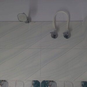 Bathroom in 1.5 BHK Apartment at Sadhana Vijay ORC, Viraj Khand – for Rent