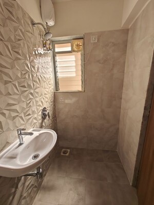 Bathroom in 1 BHK Apartment at Raunak Residency Thane, Pokhran Road No One – for Rent