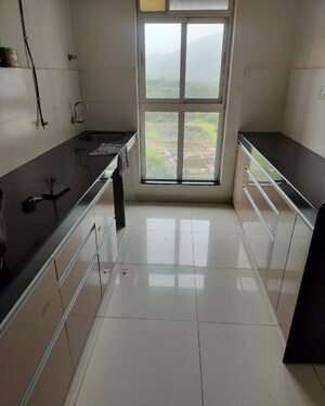 Kitchen in 2 BHK Apartment at Godrej Emerald, Ghodbunder Road – for Rent