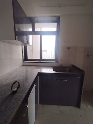 Kitchen in 2 BHK Apartment at Runwal Eirene, Balkum Pada – for Rent