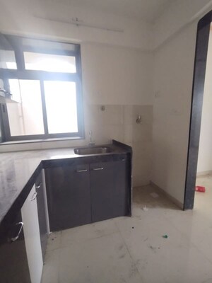 Kitchen in 2 BHK Apartment at Runwal Eirene, Balkum Pada – for Rent