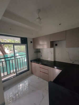 Kitchen in 1 BHK Apartment at Hava Hira CHS, Malad West – for Sale