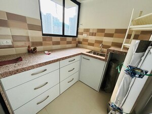Kitchen in 1 BHK Apartment at Indiabulls Greens, New Panvel – for Rent