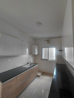 Kitchen in 2 BHK Apartment at Puravankara Purva Zenium, Hosahalli – for Rent