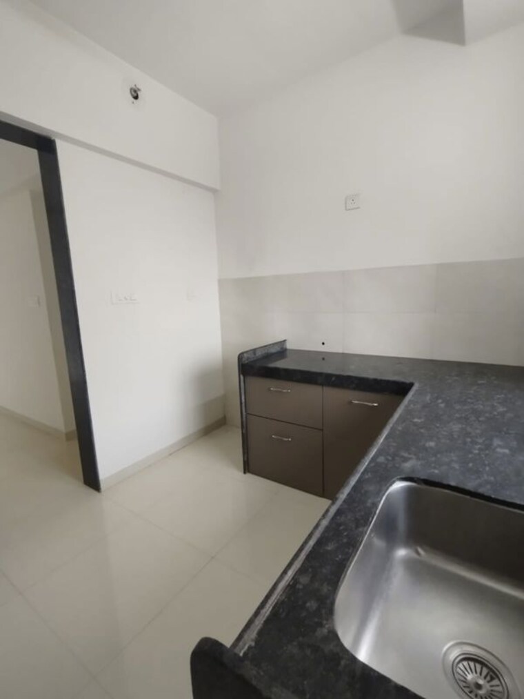 Kitchen, runwal-eirene 1 Bedroom 400 Sq.Ft. Apartment In Balkum Pada Thane 10635247