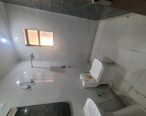 Bathroom in 4 BHK Builder Floor at Green Fields Colony – for Rent