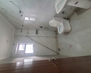 Bathroom in 4 BHK Builder Floor at Green Fields Colony – for Rent