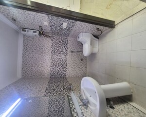 Bathroom in 4 BHK Builder Floor at Green Fields Colony – for Rent