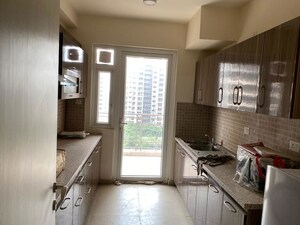 Kitchen in 3.5 BHK Apartment at Adani Oyster Greens, Sector 102 – for Rent