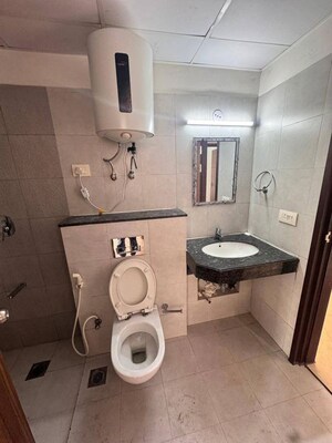 Bathroom in 2 BHK Apartment at Conscient Habitat 102, Sector 102 – for Rent