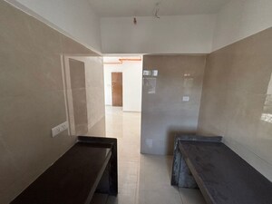 Kitchen in 2 BHK Apartment at Jivan Prakash Apartment, Matunga West – for Rent