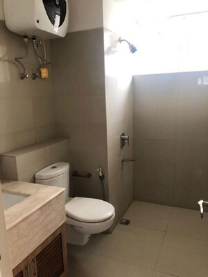 Bathroom in 4 BHK Apartment at Emaar MGF The Palm Drive Studios, Sector 66 – for Sale