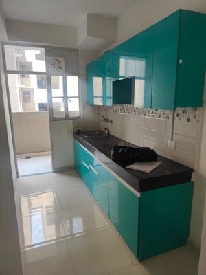 Kitchen in 2 BHK Apartment at ROF Aalayas, Sector 102 – for Sale