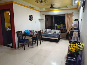 Living Room in 1 BHK Apartment at Lodha Amara, Kolshet Road – for Sale