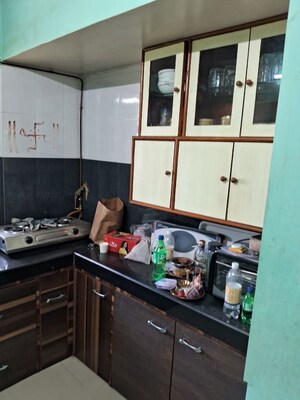 Kitchen in 2 BHK Apartment at Godrej Emerald, Ghodbunder Road – for Rent