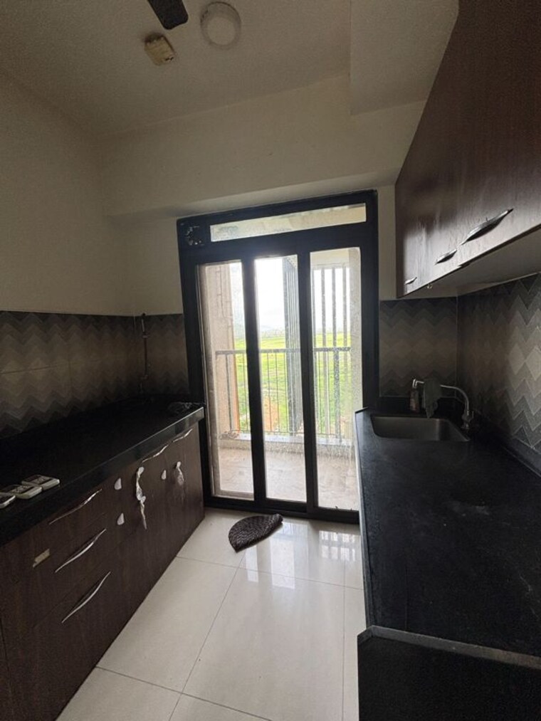 Kitchen, godrej-emerald 2 Bedroom 550 Sq.Ft. Apartment In Ghodbunder Road Thane 10635699
