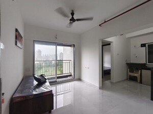 Living Room in 3 BHK Apartment at Godrej Emerald, Ghodbunder Road – for Rent