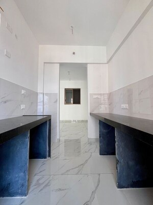 Kitchen in 2 BHK Apartment at Raymond The Address, Pokhran Road No Two – for Rent