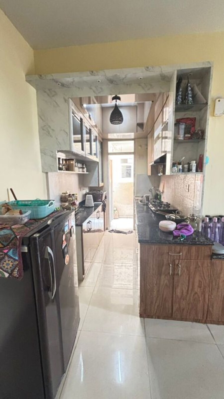 Kitchen, signature-global-the-millennia 2 Bedroom 690 Sq.Ft. Apartment In Sector 37d Gurgaon 10635711