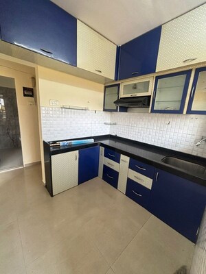 Kitchen in 3 BHK Apartment at Godrej Emerald, Ghodbunder Road – for Rent