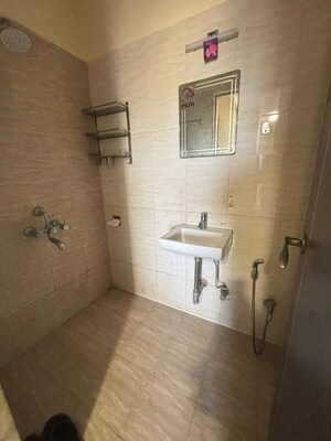 Bathroom in 3 BHK Apartment at Godrej Emerald, Ghodbunder Road – for Rent