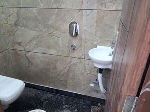 Bathroom in 3 BHK Builder Floor at E Block Shastri Nagar – for Sale