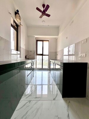 Kitchen in 2 BHK Apartment at Raymond Ten X Habitat, Pokhran Road No Two – for Rent