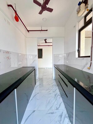Kitchen in 2 BHK Apartment at Raymond Ten X Habitat, Pokhran Road No Two – for Rent