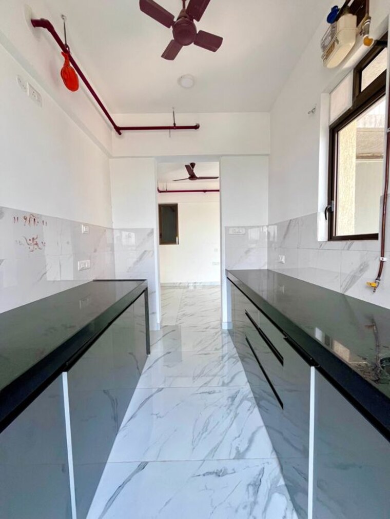 Kitchen, raymond-ten-x-habitat 2 Bedroom 650 Sq.Ft. Apartment In Pokhran Road No Two Thane 10635751
