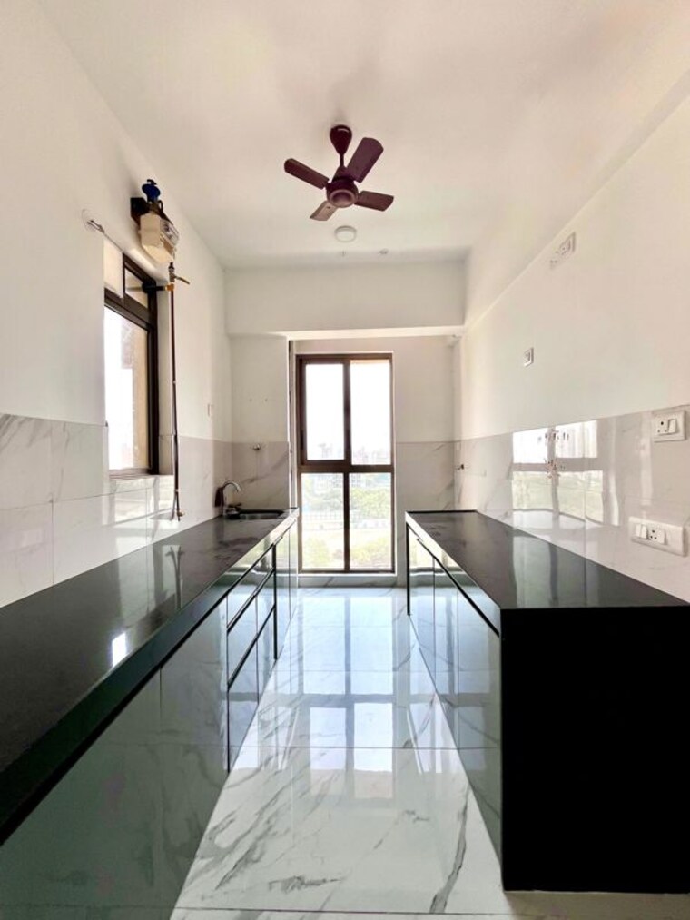 Kitchen, raymond-ten-x-habitat 2 Bedroom 650 Sq.Ft. Apartment In Pokhran Road No Two Thane 10635751