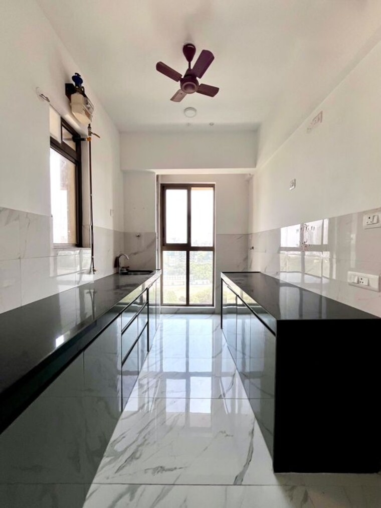 Kitchen, raymond-ten-x-habitat 2 Bedroom 650 Sq.Ft. Apartment In Pokhran Road No Two Thane 10635751