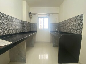 Kitchen in 1 BHK Apartment at Lodha Amara, Kolshet Road – for Sale