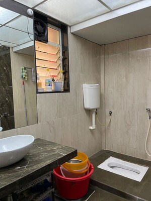 Bathroom in 3 BHK Apartment at SAA Sai Avishkar, Dhayari – for Rent