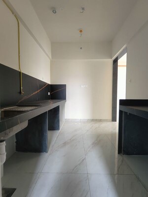 Kitchen in 4 BHK Apartment at Raymond The Address, Pokhran Road No Two – for Rent