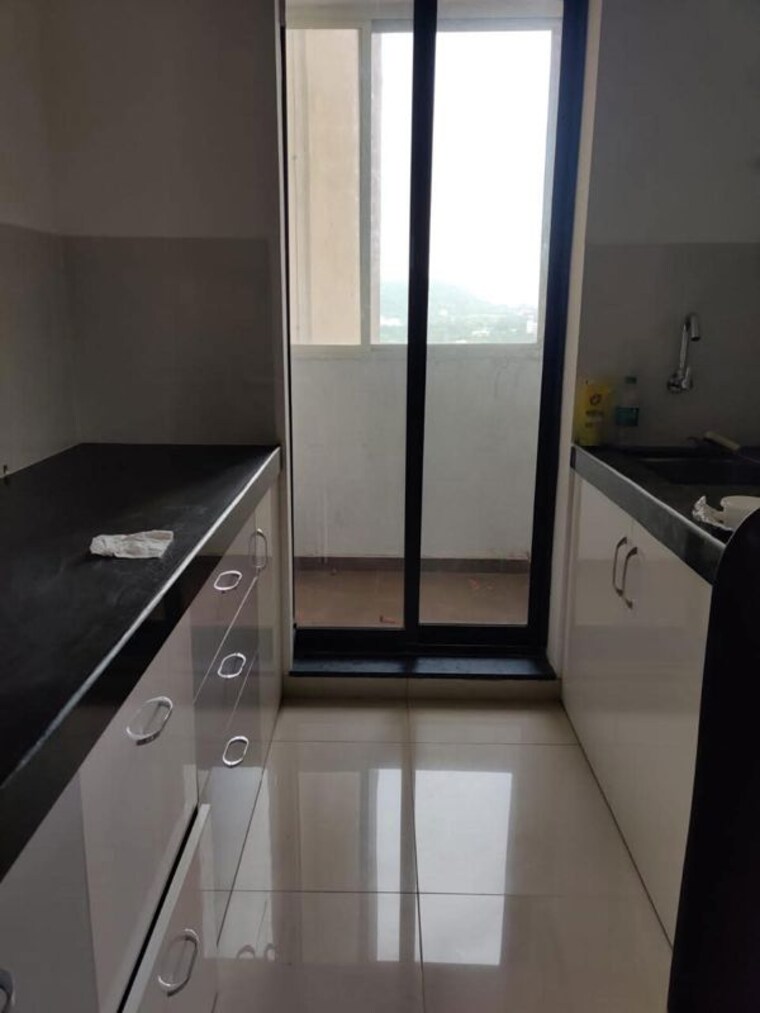 Kitchen, shapoorji-pallonji-joyville-hinjewadi 2 Bedroom 875 Sq.Ft. Apartment In Hinjewadi Pune 10635966