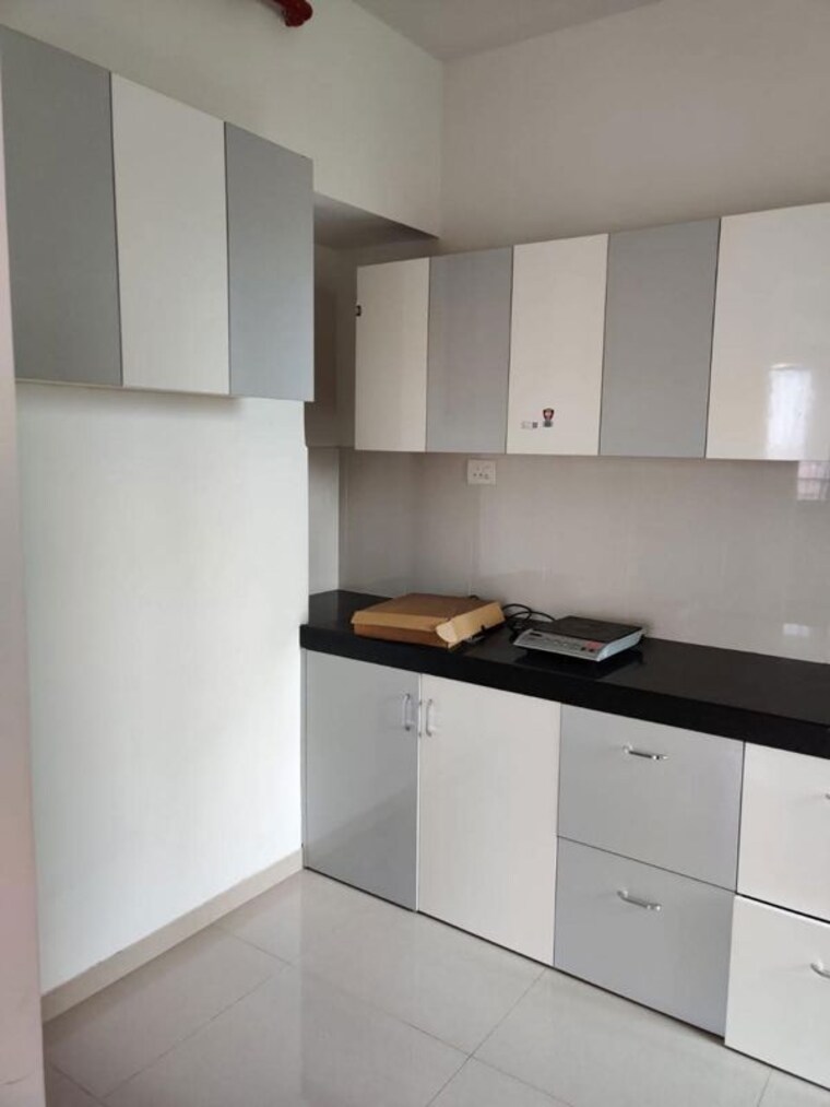 Kitchen, shapoorji-pallonji-joyville-hinjewadi 2 Bedroom 875 Sq.Ft. Apartment In Hinjewadi Pune 10635966