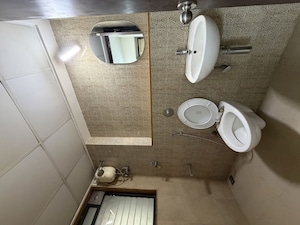 Bathroom in 1.5 BHK Apartment at Lodha Lakeshore Greens, Dombivli East – for Rent