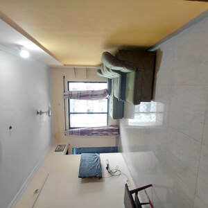 Living Room in 2 BHK Apartment at Satellite Garden, Goregaon East – for Sale